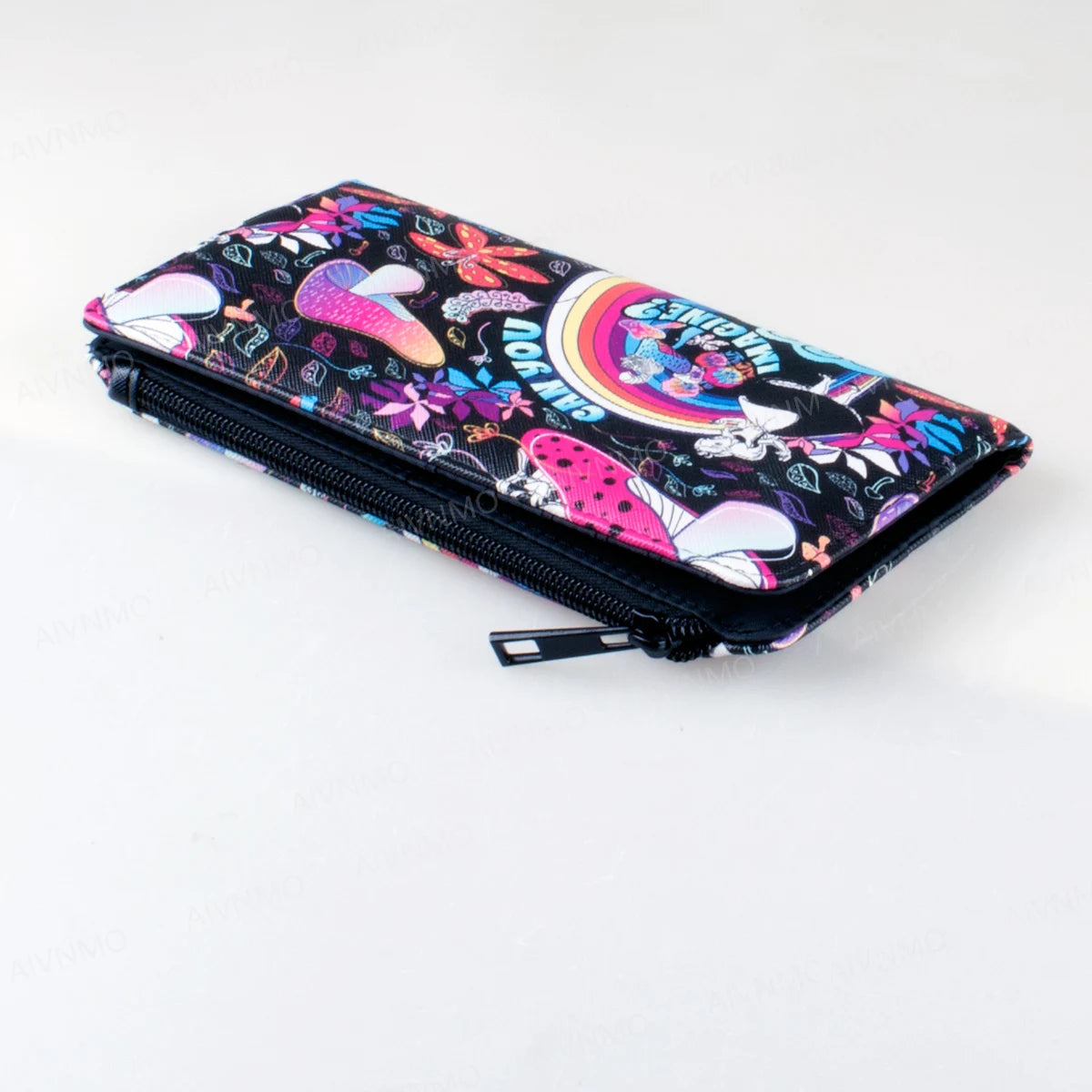 A colorful, patterned bifold wallet with a zipper and an ID window is shown lying flat.