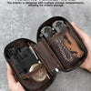 A hand holds an open dark brown organizer pouch revealing multiple compartments for storing tools and accessories.