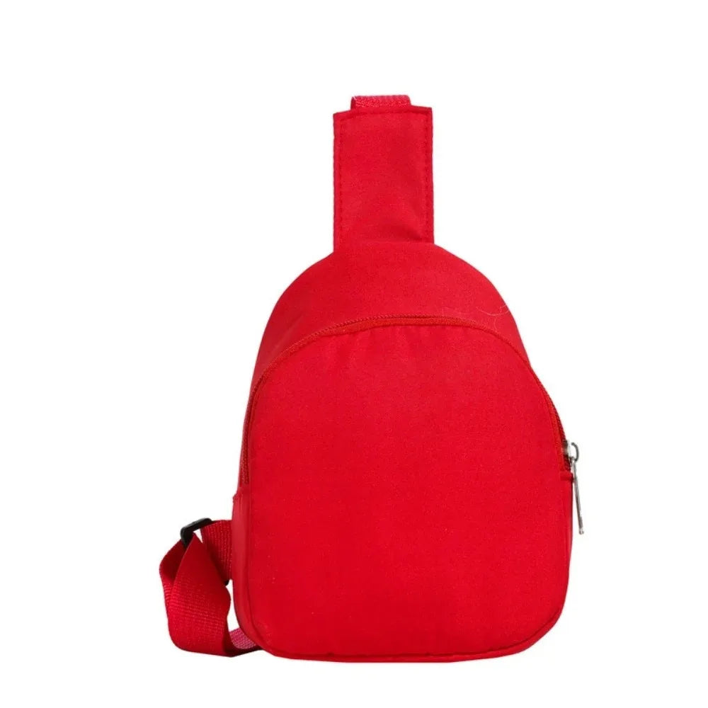 A bright red nylon crossbody bag for kids.