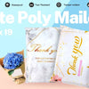 A stack of cute poly mailers with thank you messages and a bouquet of blue flowers.