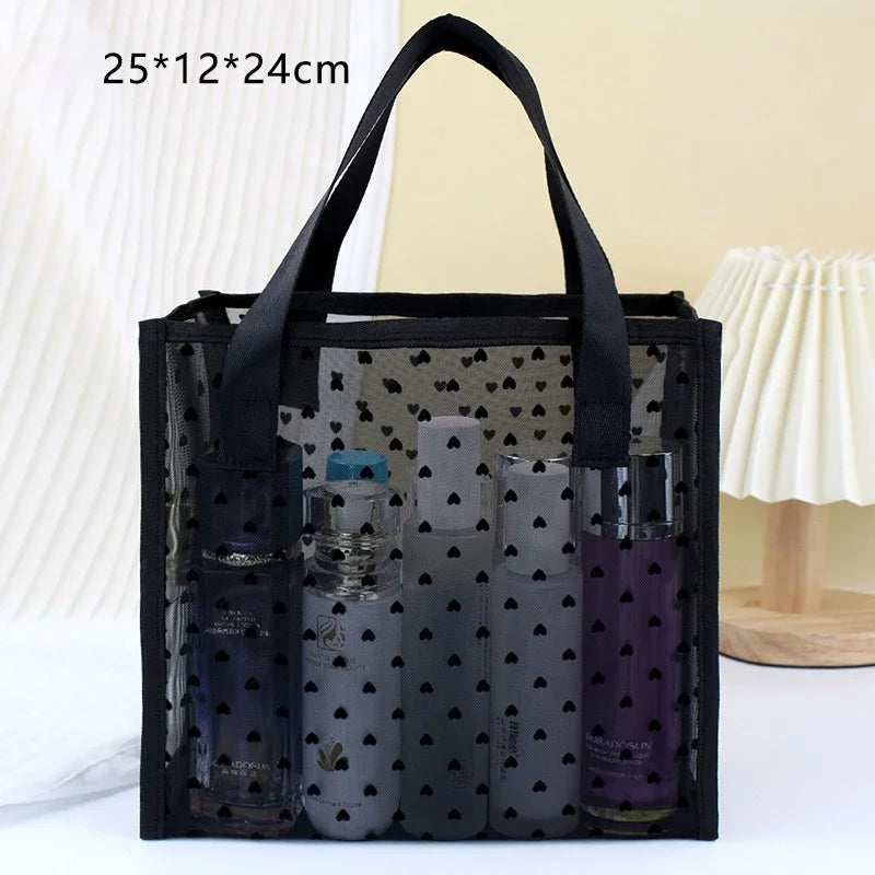 Black mesh storage bag filled with various glass makeup bottles and containers