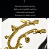 Gold alloy chain necklace featuring a cherry flower bag pendant and a star charm.