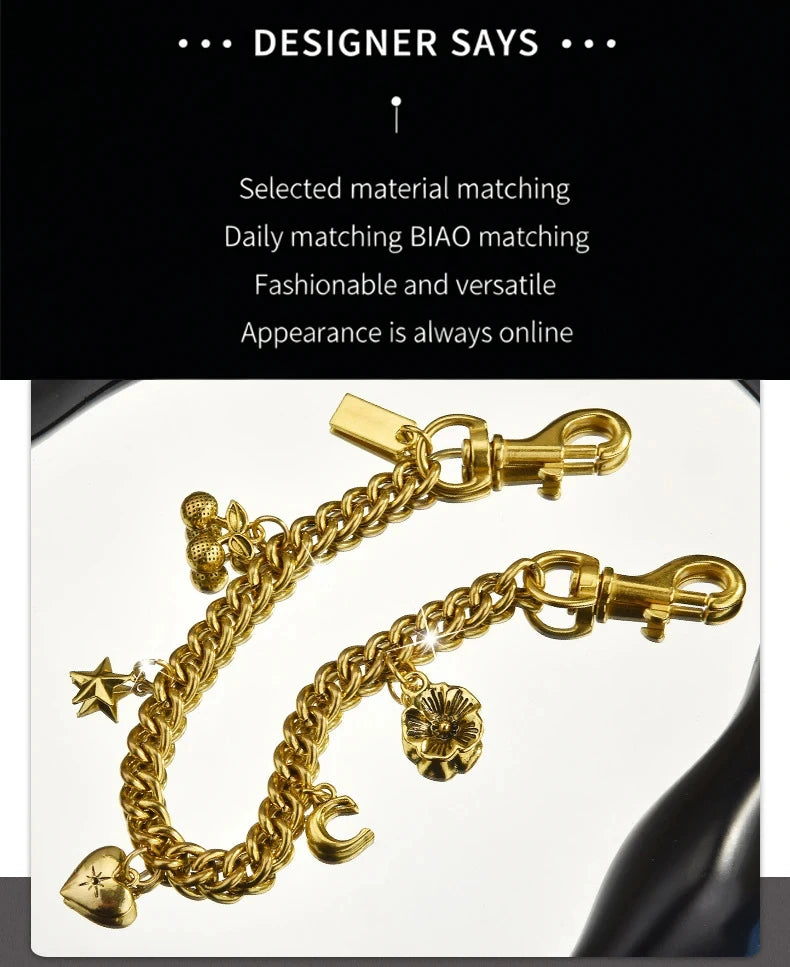 Gold alloy chain necklace featuring a cherry flower bag pendant and a star charm.