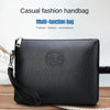 A black multi-function casual fashion handbag with a silver zipper and leather strap.