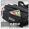 Black plaid crossbody chest bag with a zipper and adjustable strap shown in a white setting.