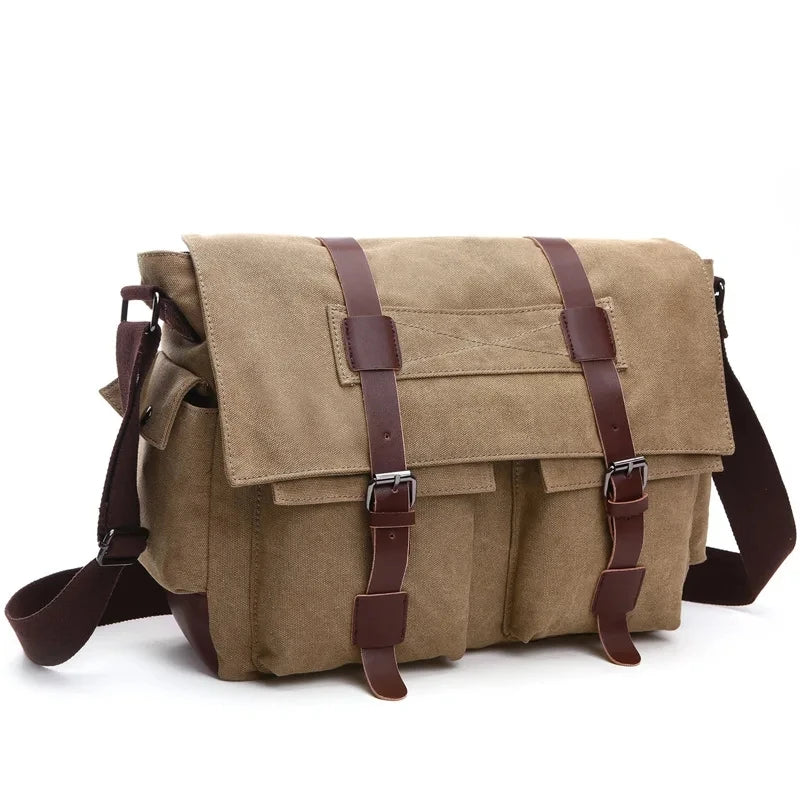 A tan canvas messenger bag for men with brown leather straps and buckles.