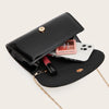 A black elegant clutch purse is shown open, containing a smartphone and a red lipstick.