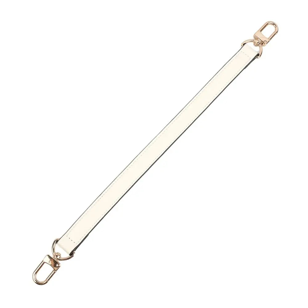 A beige genuine leather replacement shoulder strap with gold-toned hardware.
