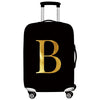 Black rolling luggage with a gold letter B design