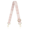 A pink and white chevron patterned nylon crossbody bag strap.