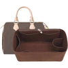 A brown felt purse organizer insert with a light tan handle is shown.