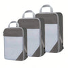 A set of three gray and white fabric storage organizers with handles.