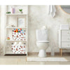 A white toilet with a tissue dispenser and surrounding storage shelves displaying various items.