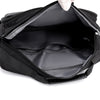 Black waterproof business briefcase open showing the interior compartment