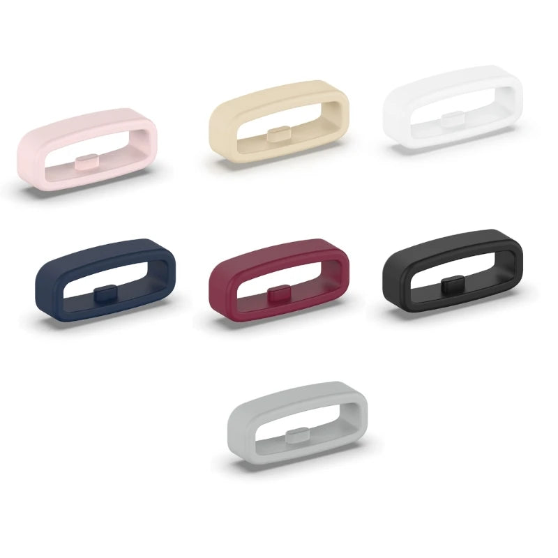 A set of five silicone watch strap retainer rings in various colors including pink, beige, white, dark blue, and black.