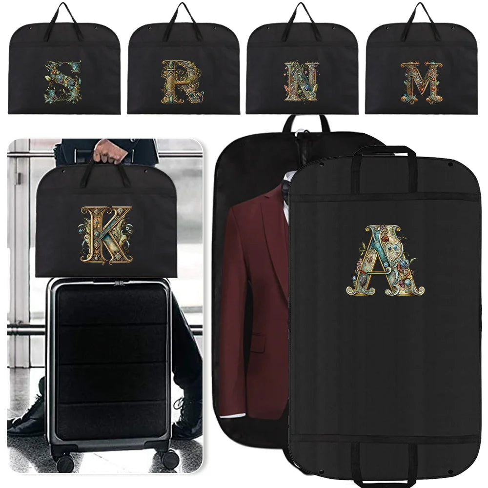 A set of black fabric dust covers and storage bags featuring gold embroidered letters S, R, N, M, K, and A.