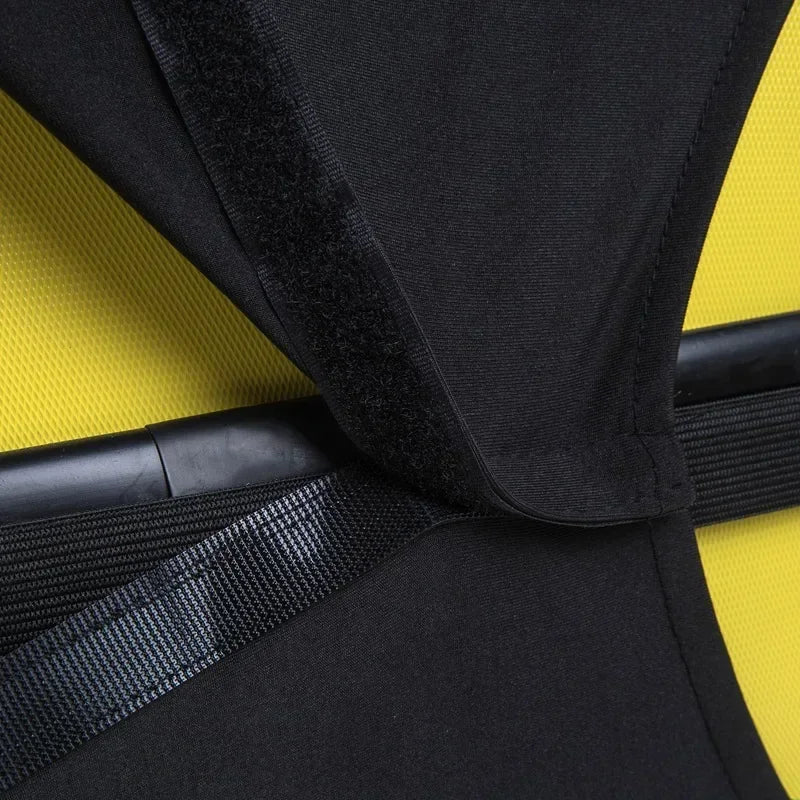 Black stretch fabric luggage protector cover with black strap on a yellow background