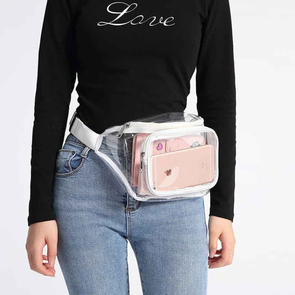 A woman wearing a pink clear waterproof fanny pack and light wash jeans, with the word Love printed on her black long-sleeved