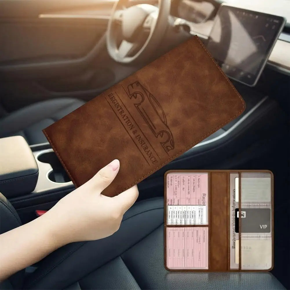 A brown PU leather car document organizer with clear pockets is placed on the passenger seat console.