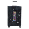 A black luggage protection cover with a silver handle and white silhouette designs on the surface.