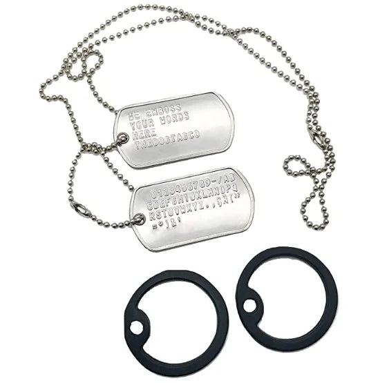 A silver military dog tag necklace set with a chain and two engraved tags.