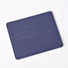 Porta tarjetas de cuero PU azul oscuro con múltiples ranuras y líneas grabadas.