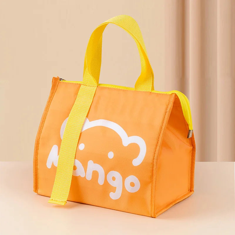 Orange insulated lunch bag with a white cartoon mango design and yellow handles