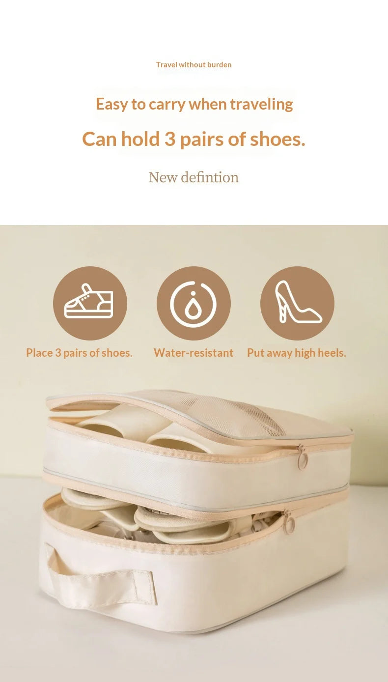 A beige portable luggage shoe organizer bag shown with three pairs of shoes inside.