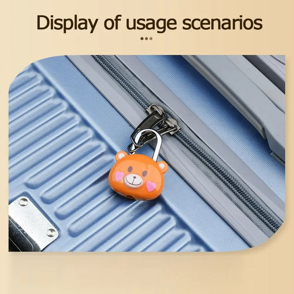 An orange bear-shaped combination padlock is shown attached to a silver zipper on a blue fabric.