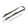 A black camouflage durable outdoor camping crossbody strap with an adjustable length.