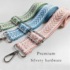 Three patterned fabric straps in green, blue, and pink with silver hardware