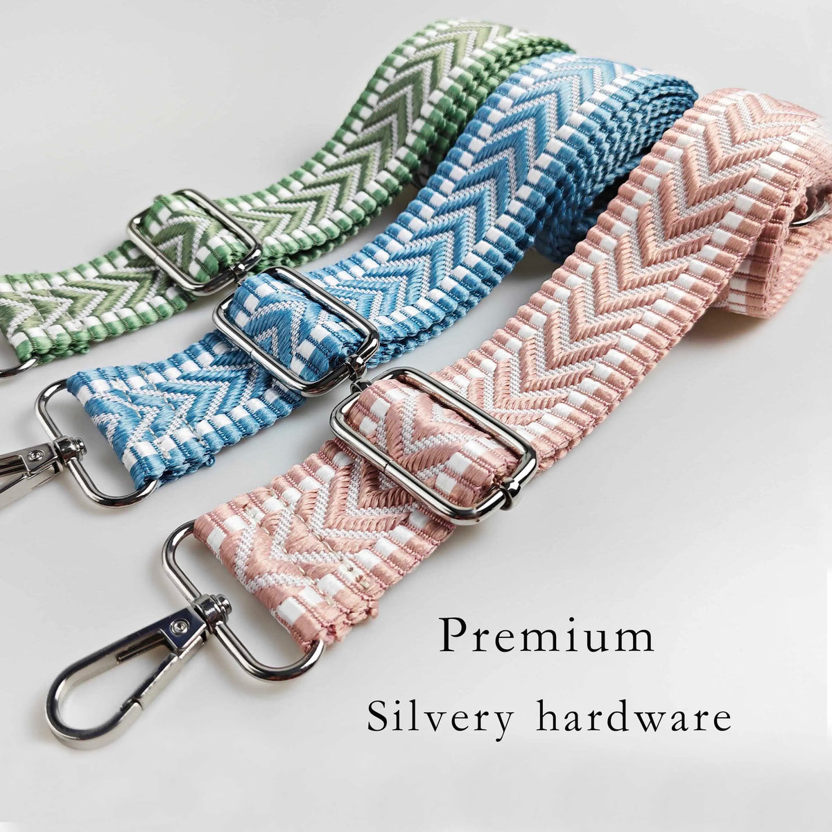 Three patterned fabric straps in green, blue, and pink with silver hardware