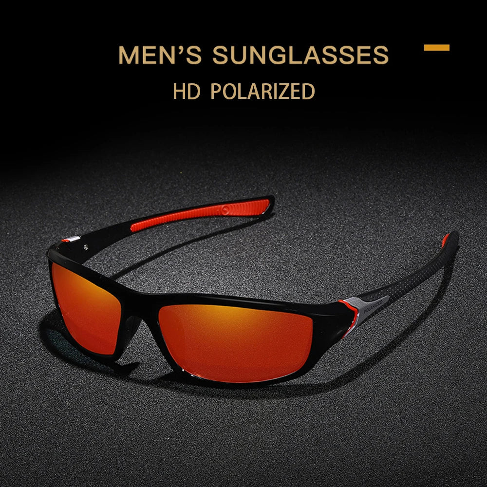 Un par de gafas de sol polarizadas de tono naranja descansando sobre una superficie oscura.
