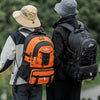 A person wearing a black backpack is shown in an outdoor setting, with an orange and black hiking backpack visible.