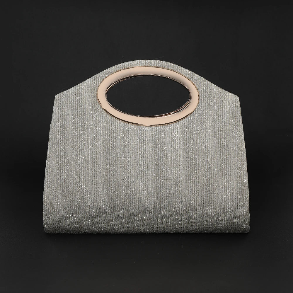 A light gray pleated circular evening handbag with a rose gold rim.