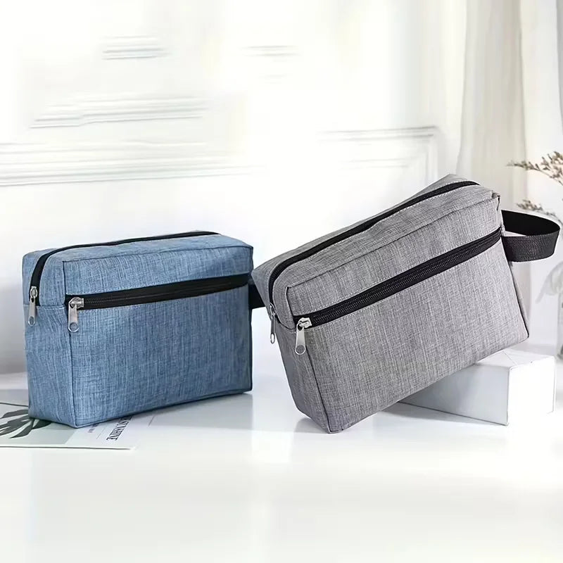 A light blue and gray multifunctional travel toiletry bag lying on a white surface.