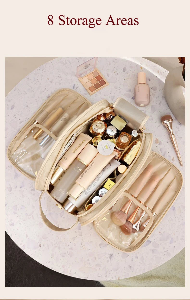 A beige PU leather travel makeup organizer with double zippers filled with various cosmetic products and tools.