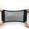 A black net bag designed for universal car trunk storage, being held by hands.