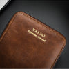 A brown retro PU leather men's wallet with gold embossed text on the cover.