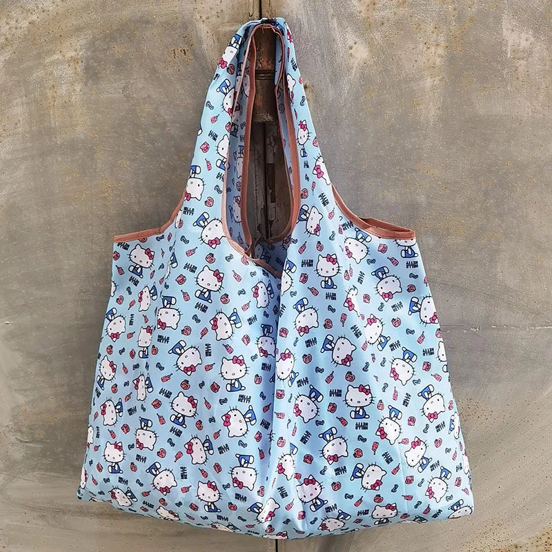 A light blue patterned reusable shopping bag with a brown lining is displayed against a concrete background.