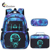 A purple and blue graffiti-themed backpack featuring a stylized gamer character design.