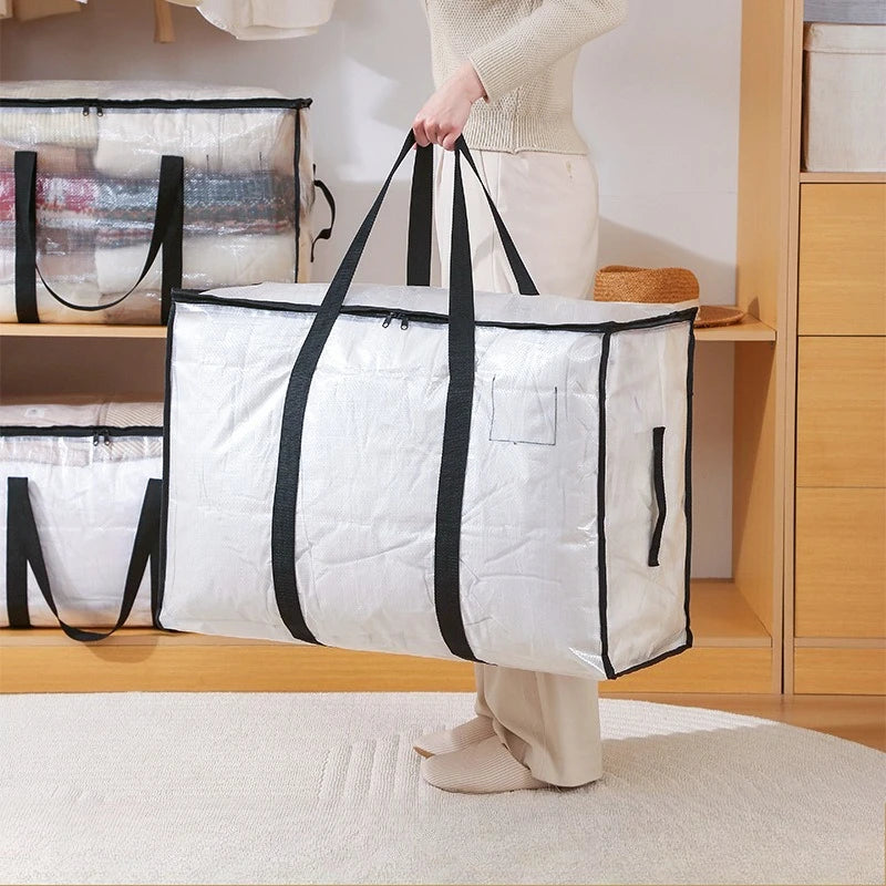 A person holds a large white woven storage bag with black straps and double zippers in a light indoor setting.