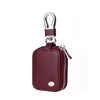 A maroon leather protective case with a silver clasp for earphones.