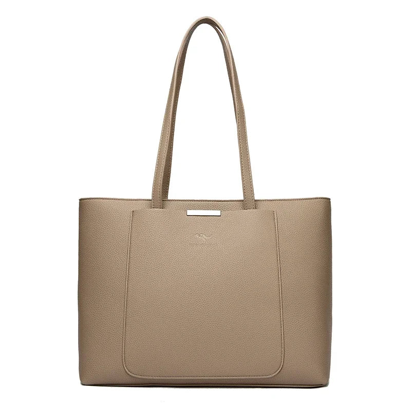 A tan leather shoulder bag with a top handle and flap closure.