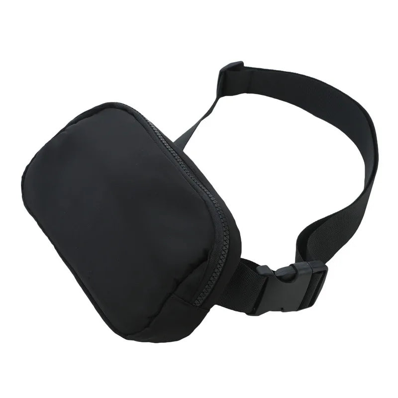 Black waist bag or fanny pack worn around the waist.