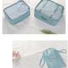 A light blue fabric travel light organizer set featuring a zippered storage bag and a separate drawstring pouch.