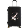 Black luggage with a pink floral letter Z design and silver handle.