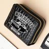 Black fashion PU leather double zipper wallet with gold stitching on a light background.