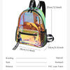 A clear, laser transparent PVC backpack with a vibrant, iridescent finish.