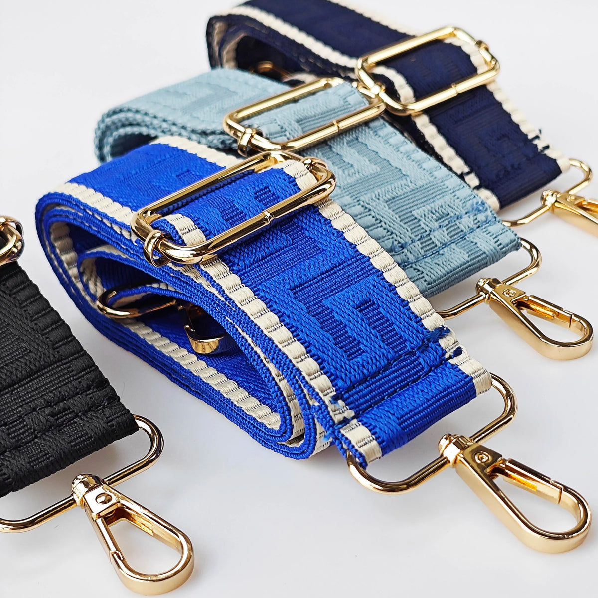 Blue and gray patterned adjustable crossbody bag strap with gold hardware
